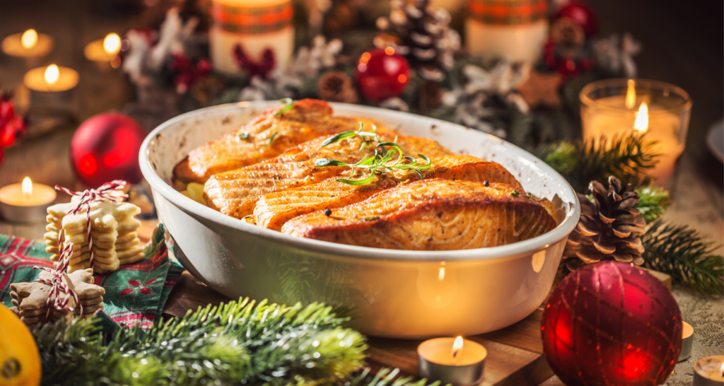 Salmon Fillets in a oven dish with Christmas table setting