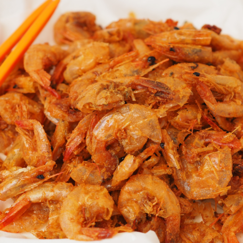 Crispy Fred Shrimp with Spicy Salt and Singapore Sauce close up