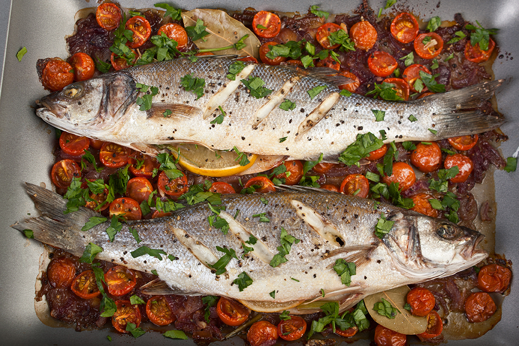 Whole Baked Seabass with Mediterranean Tomatoes, Garlic and Potato Bake