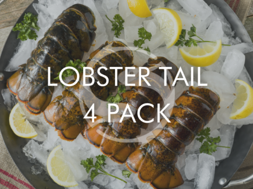 lobster tails on ice with lemon
