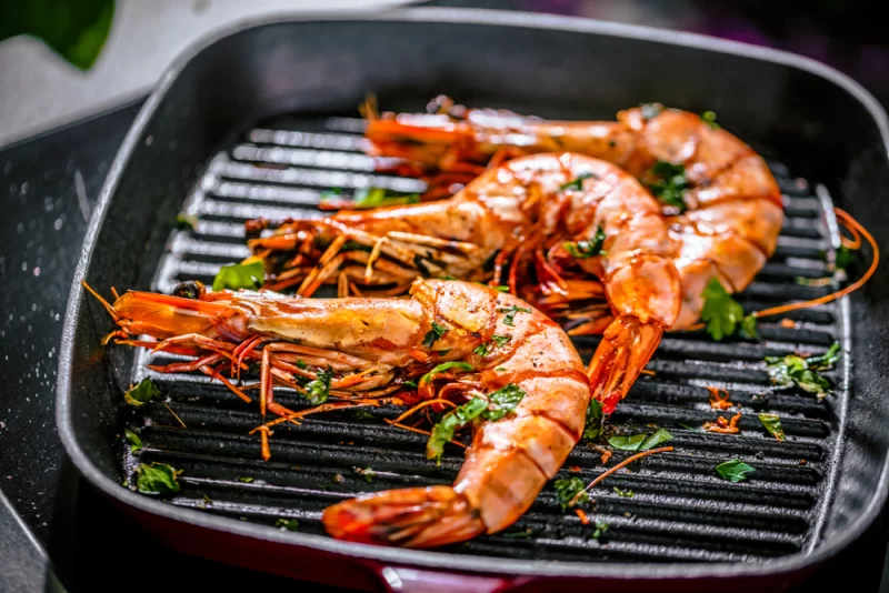 black tiger prawns cooked shell on in a pan